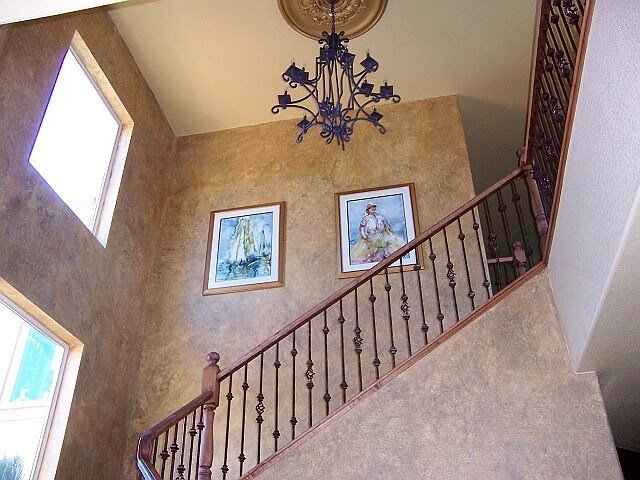 Warm layered faux finish staircase inspiration